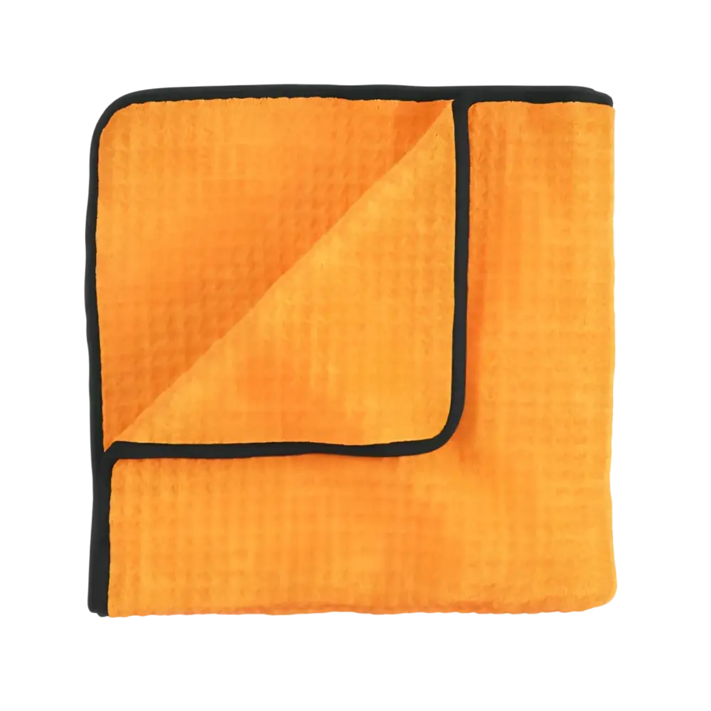 Orange microfiber cleaning towel with black edge trim, folded showing textured surface