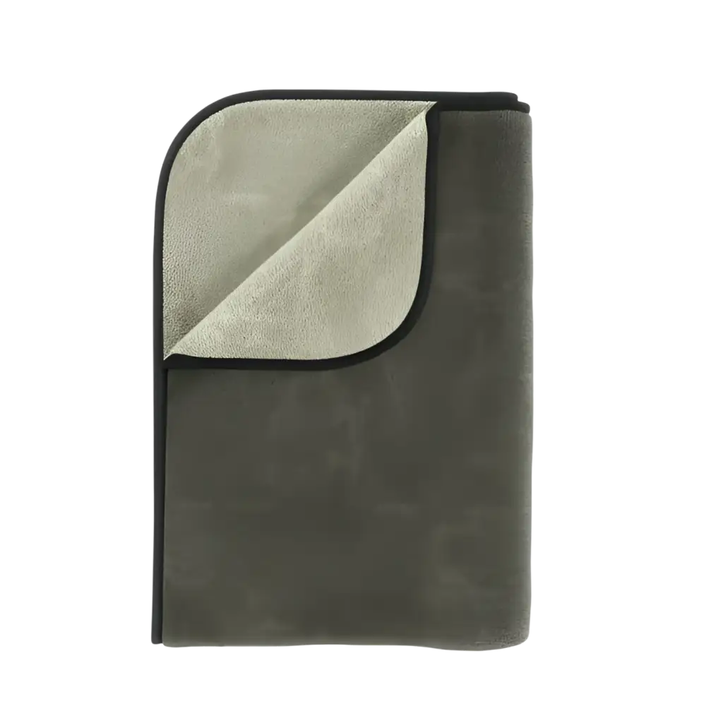 Folded microfiber towel in muted gray and light gray with black trim