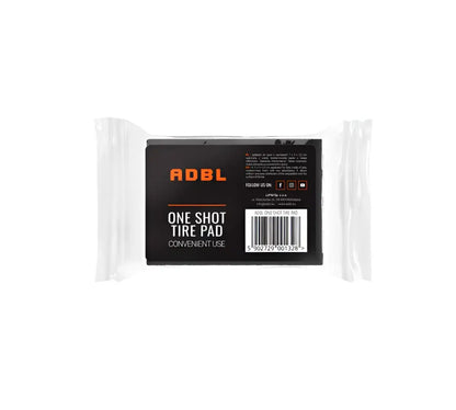 ADBL One Shot Tire Pad in clear packaging with black label for convenient tire care