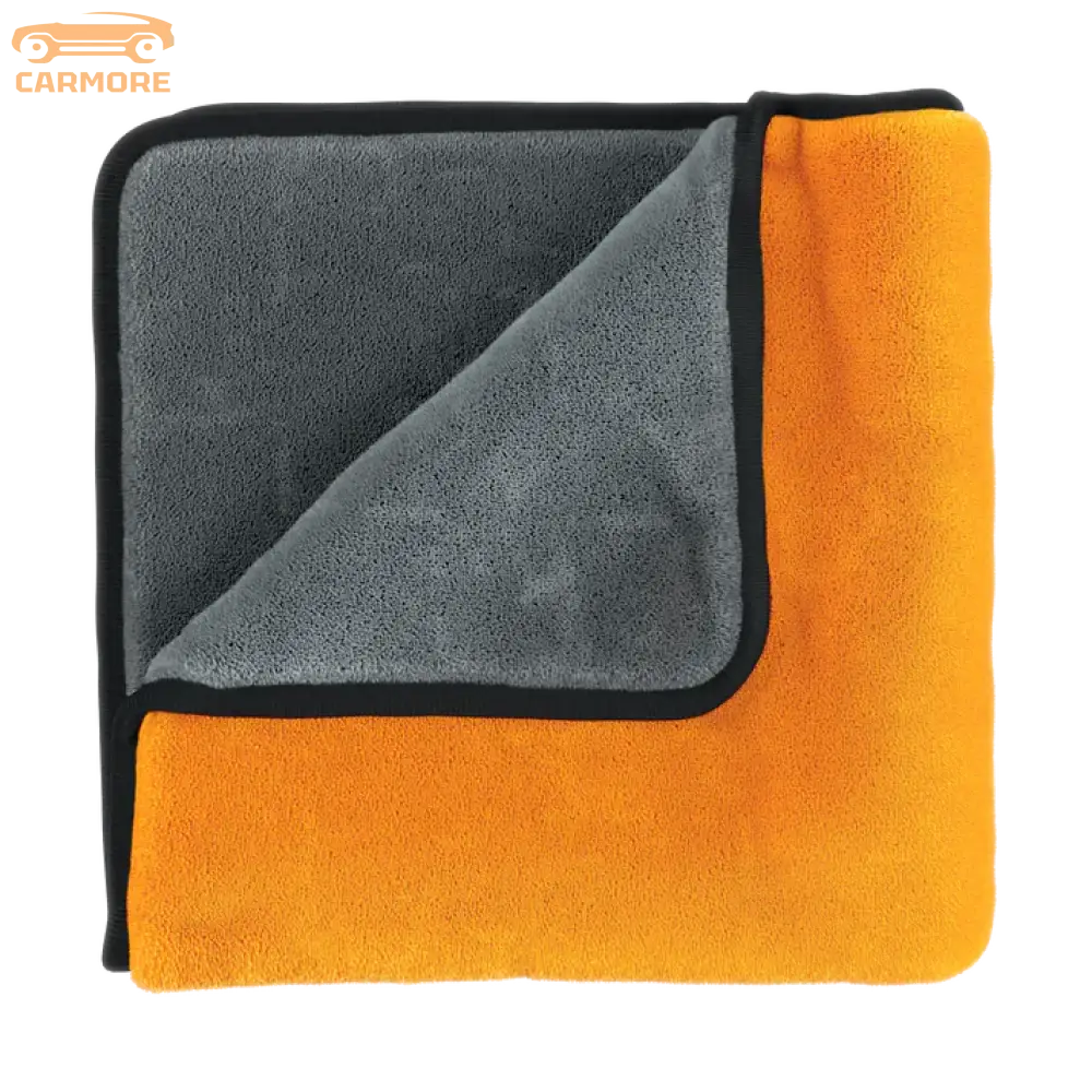 Soft dual-sided microfiber towel with orange and gray sides and black trim