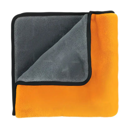 Soft dual-sided microfiber towel with orange and gray sides and black trim