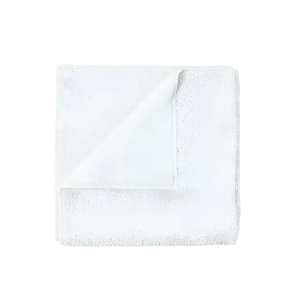 White soft cotton towel folded on a clean white background