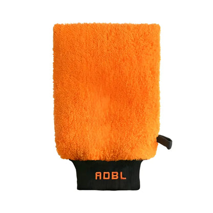 Orange microfiber wash mitt with black cuff and ADBL logo for car detailing